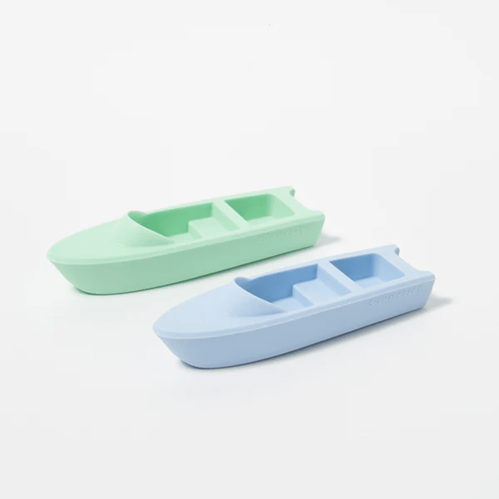 little plastic toy boats