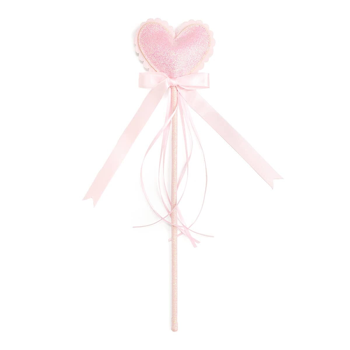 Pink heart-shaped wand with ribbons on a white background